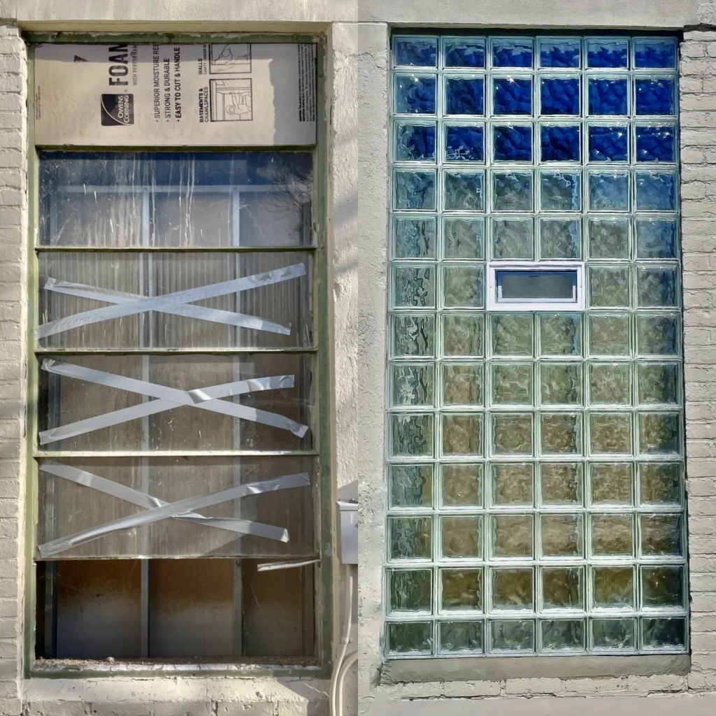 Boarded opening beside new vented glass block window